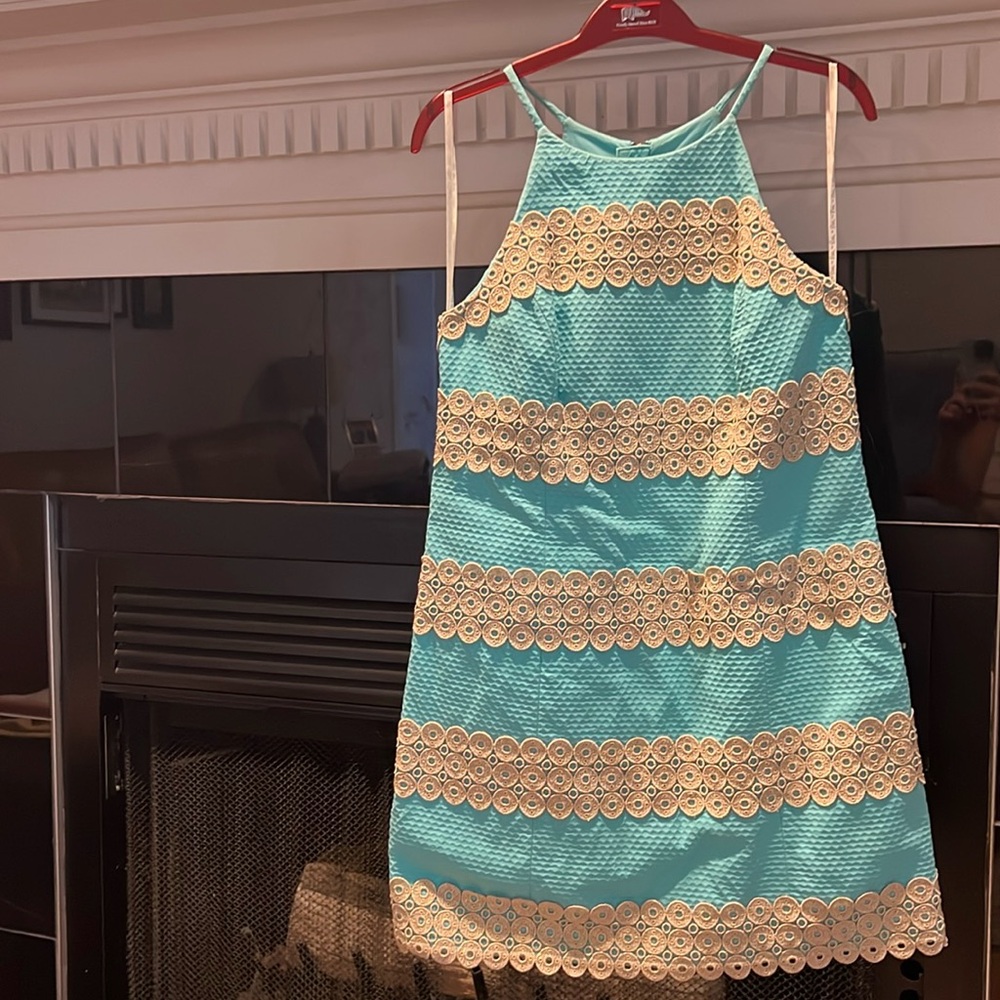 Like new Lily Pulitzer Teal dress with gold embroidery. Size 4